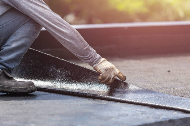 Professional Waterproofing technician working in Huntington, VA